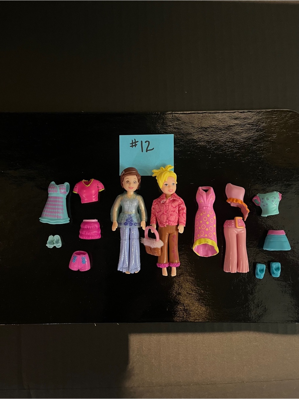 3 for $30Mattel Mini Fashion Dolls w
Pink, Teal and Purple Wardrobe Polly Pocket